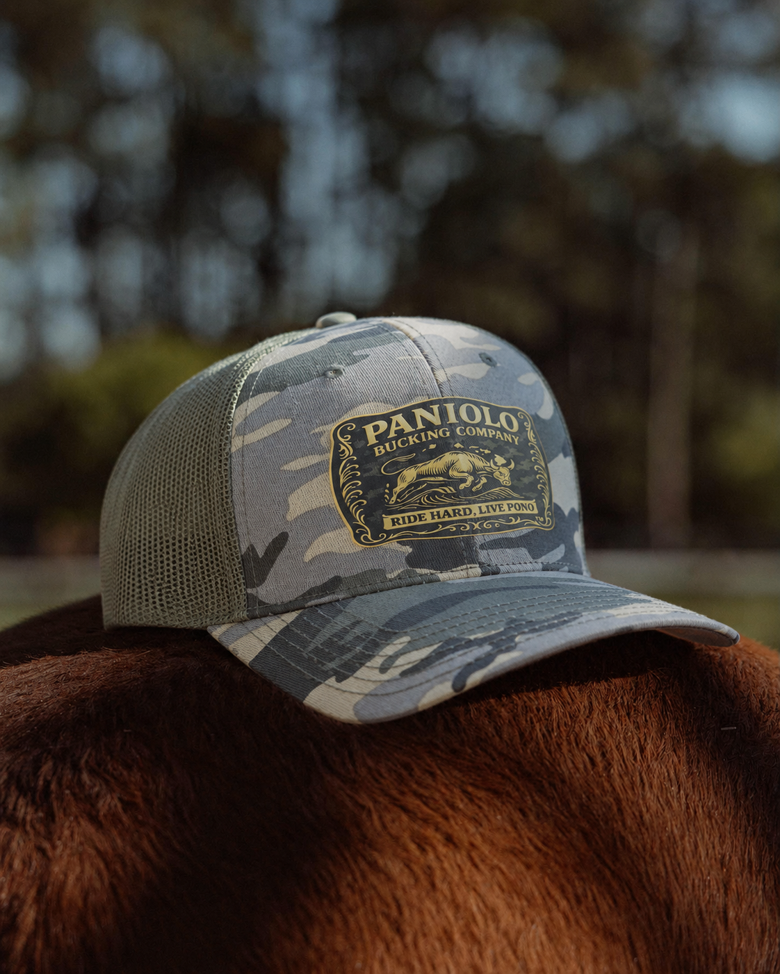 Paniolo Bucking Company™ Camo Trucker Hat